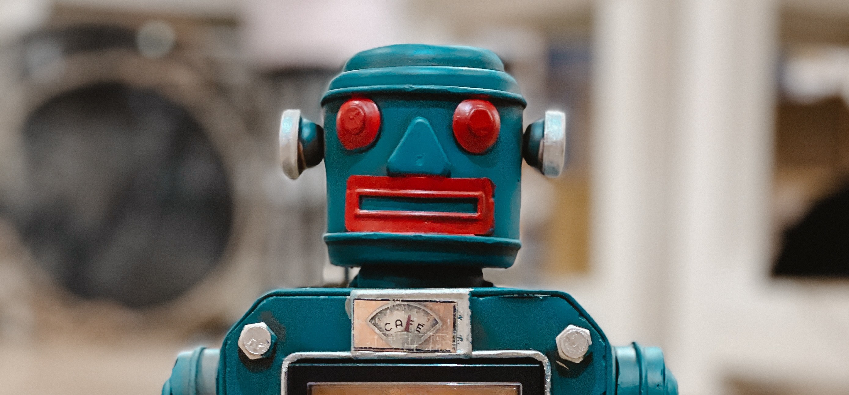 Robot toy head and shoulders, illustrating BCG's use of a chatbot