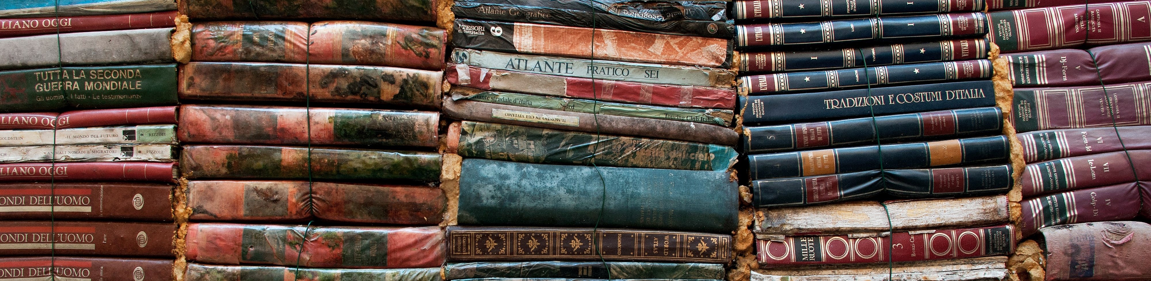 large dense stack of old books