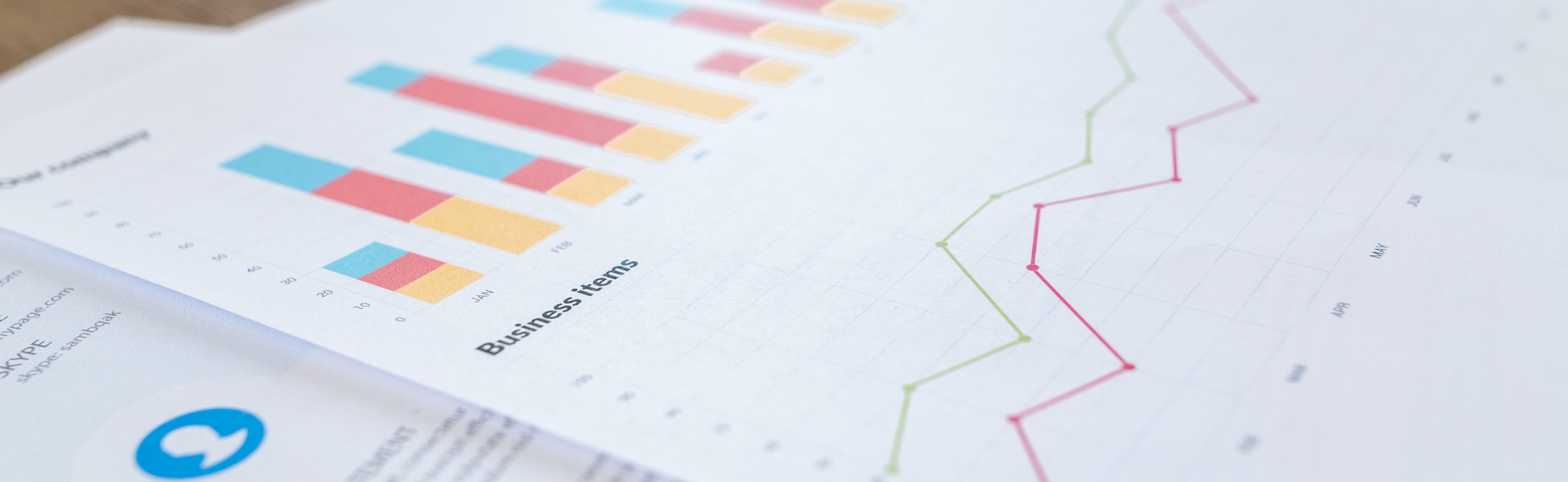 papers showing business information and charts